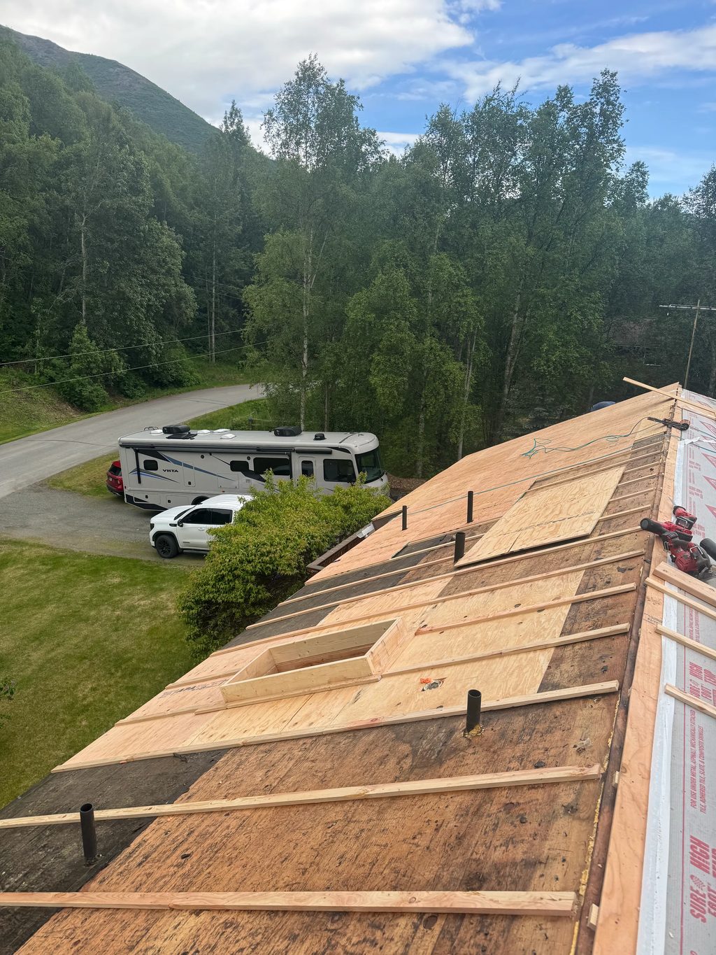 Interlock Aluminum Cedar Shingle Metal Roofing – Tile Red | Chugiak, AK (During installation)
