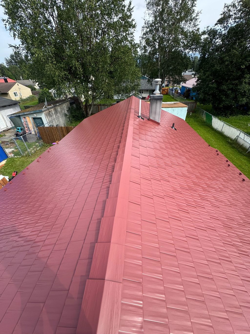 Interlock Aluminum Cedar Shingle Metal Roofing – Tile Red | Anchorage, AK (Ridge line)