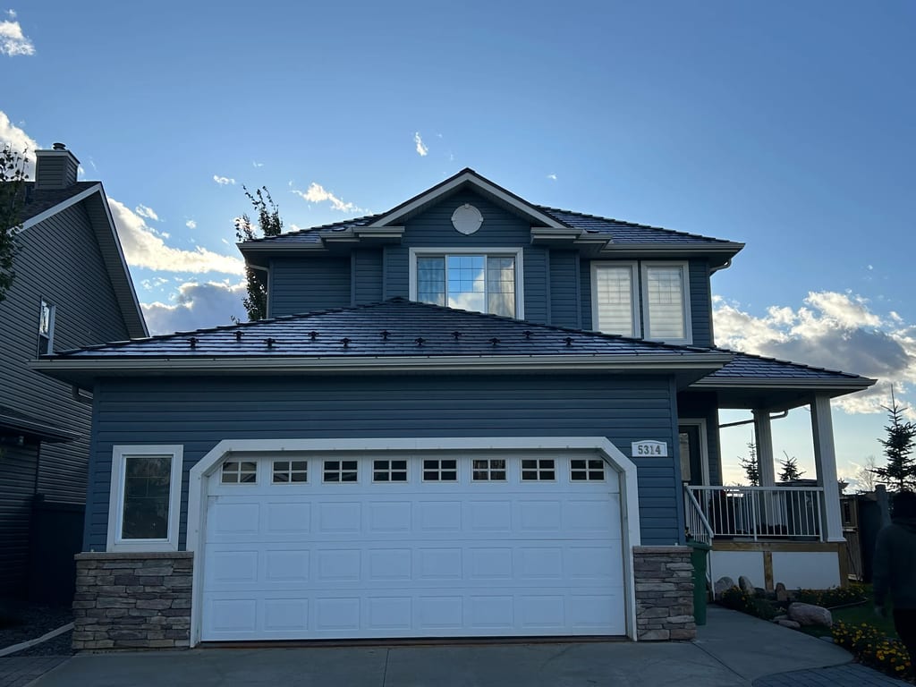 Black Interlock Slate aluminum roof on a two-storey home with a metal roof in Beaumont, Alberta, Beaumont, Alberta