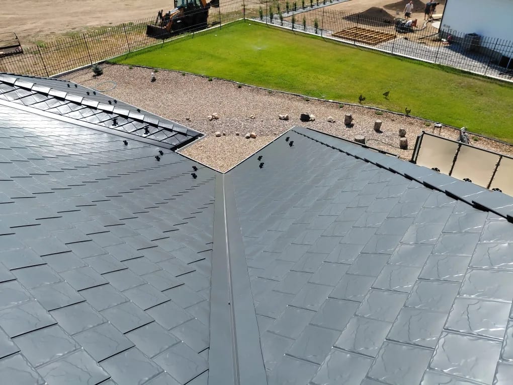 Deep Charcoal Interlock Slate aluminum roof on a Dunmore home with a metal roof in a rural setting, Dunmore, Alberta
