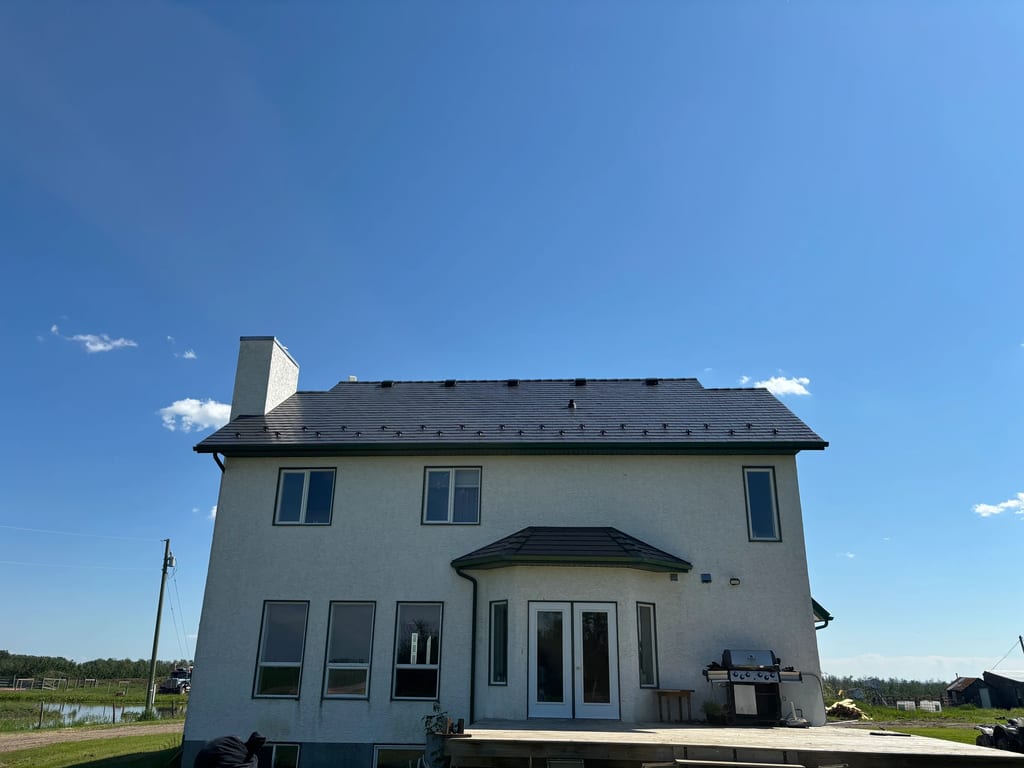 Deep Charcoal Interlock Slate aluminum roof on a Fairview, Alberta home with a two-storey, Deep Charcoal, Fairview, Alberta