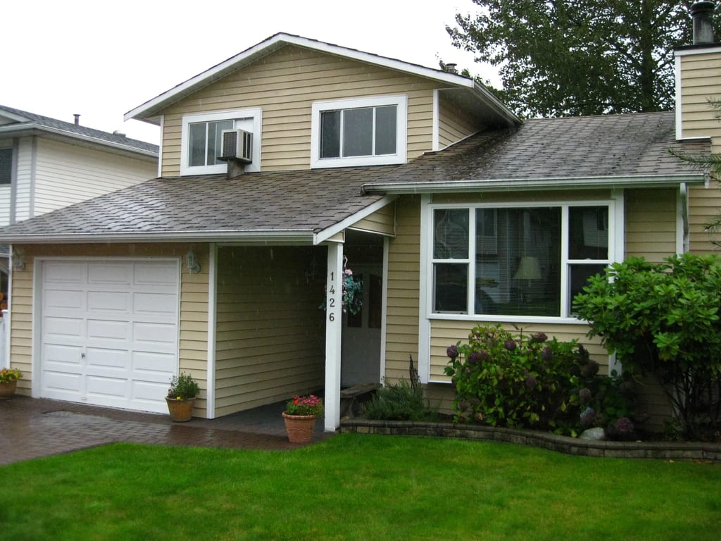 Before: a rotten asphalt shingle roof on the home, Coquitlam, British Columbia, ahead of an Aged Copper Interlock Slate aluminum roof