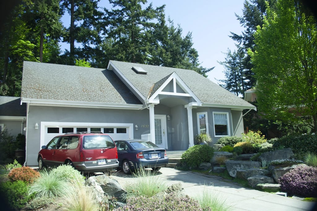 Before: a rotten asphalt shingle roof on the home, Victoria, British Columbia, ahead of a Black Interlock Slate aluminum roof