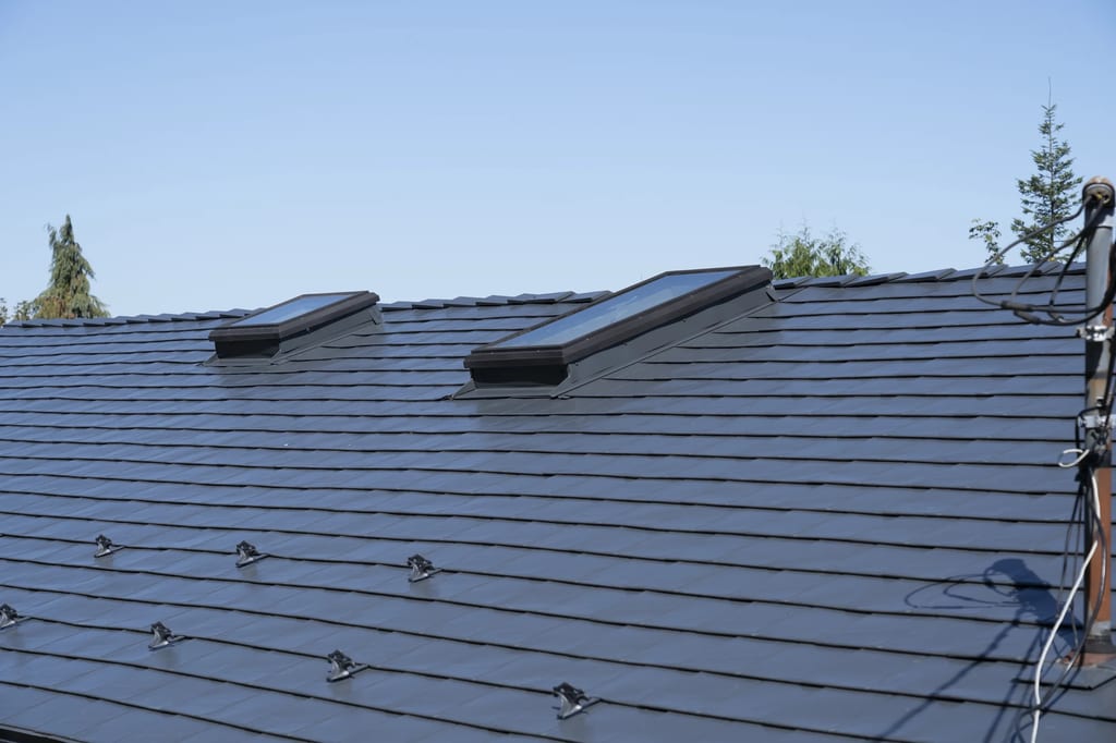 Deep Charcoal Interlock Slate aluminum roof on a deep charcoal roof on a house in Ladysmith, BC, Ladysmith, British Columbia