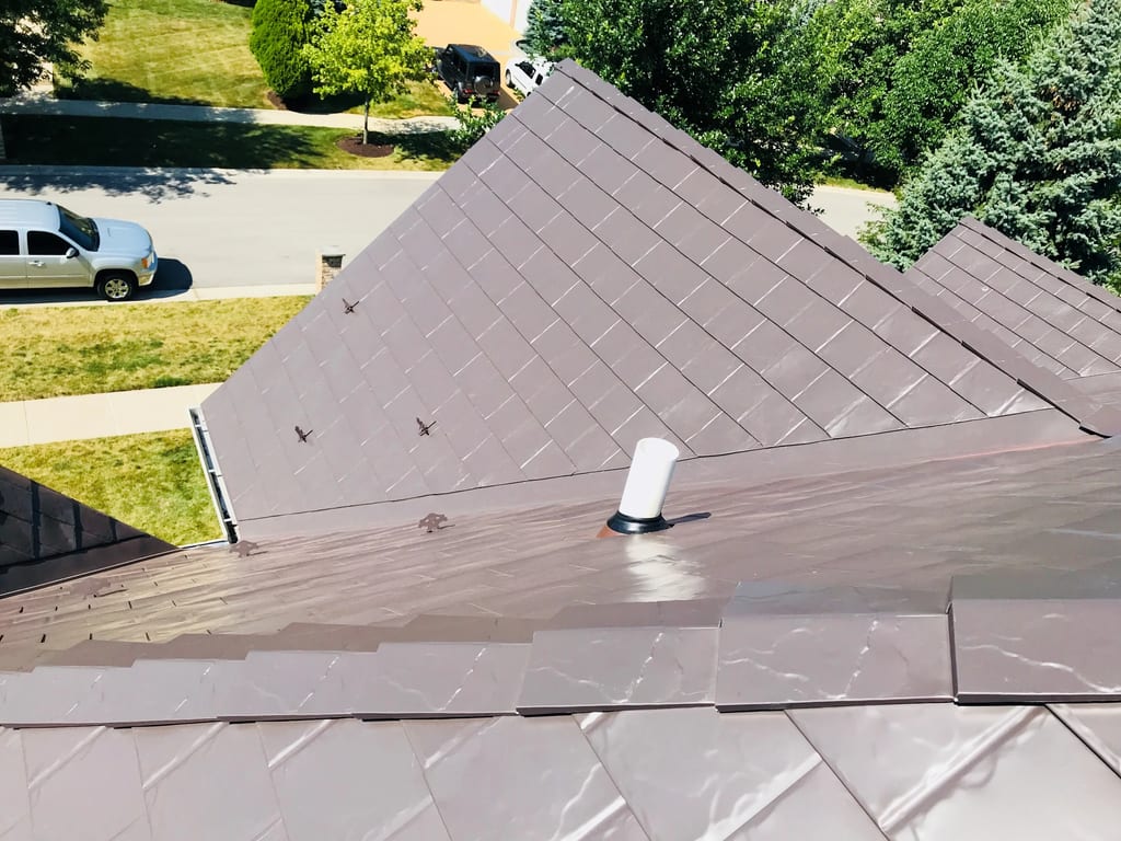 Tudor Brown Interlock Slate aluminum roof on a Tudor brown metal roof on a colonial home in a suburban, Roselle, Illinois