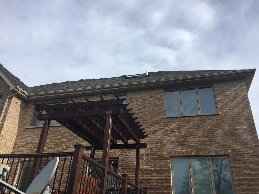 Before: a leaking asphalt shingle roof on the home, Roselle, Illinois, ahead of a Tudor Brown Interlock Slate aluminum roof