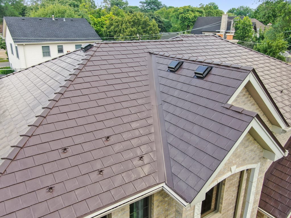 Colonial Brown Interlock Slate aluminum roof on a colonial home with a brown metal roof in the Calredon, Calredon Hills, Illinois