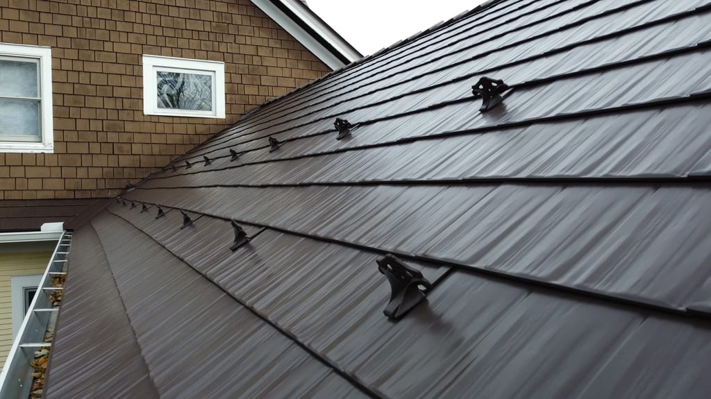 Colonial Brown Interlock Cedar Shingle aluminum roof on a colonial brown metal roof on a brown house in a suburban, La Grange, Illinois