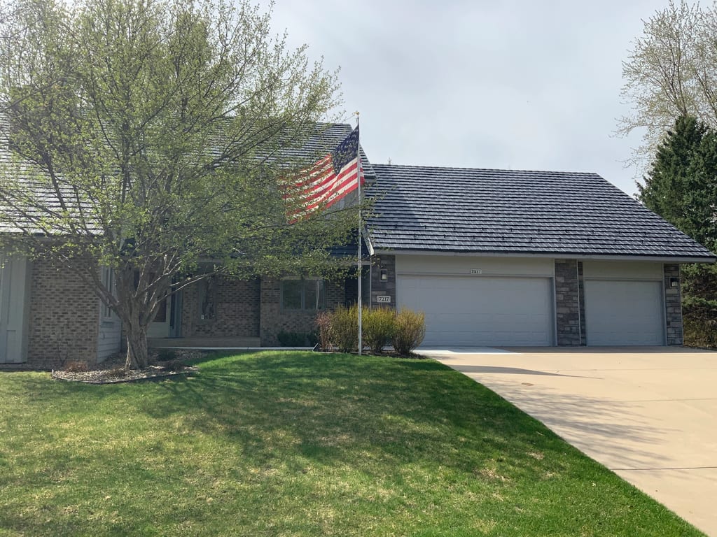 Black Interlock Shake aluminum roof on a ranch home with a metal roof in a suburban setting, Bloomington, Minnesota