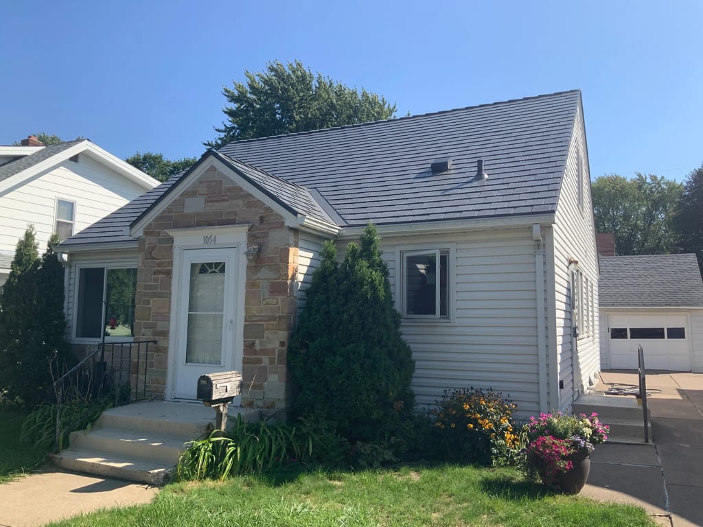 Musket Grey Interlock Slate aluminum roof on a cream-coloured ranch home with a grey metal roof and a, St. Paul, Minnesota