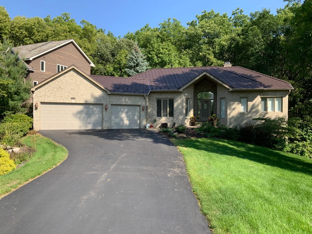 Colonial Brown Interlock Shake aluminum roof on a brown single-storey home with a brown metal roof in a, Bloomington, Minnesota
