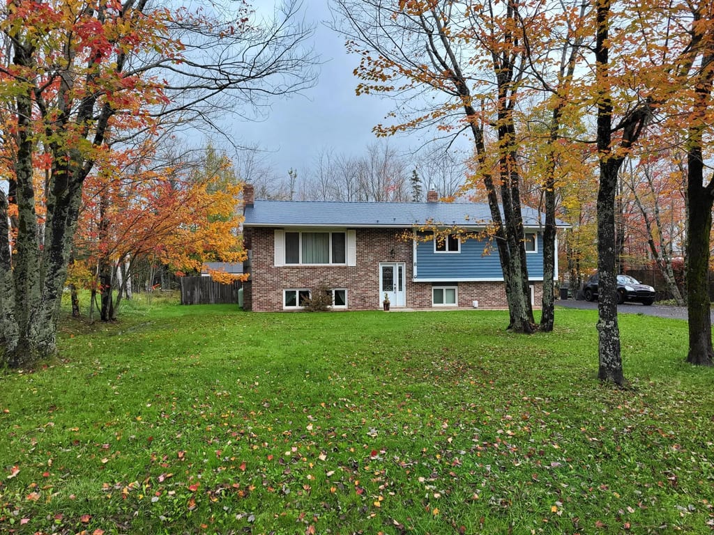 Deep Charcoal Interlock Cedar Shingle aluminum roof on the home, Lantz, Nova Scotia