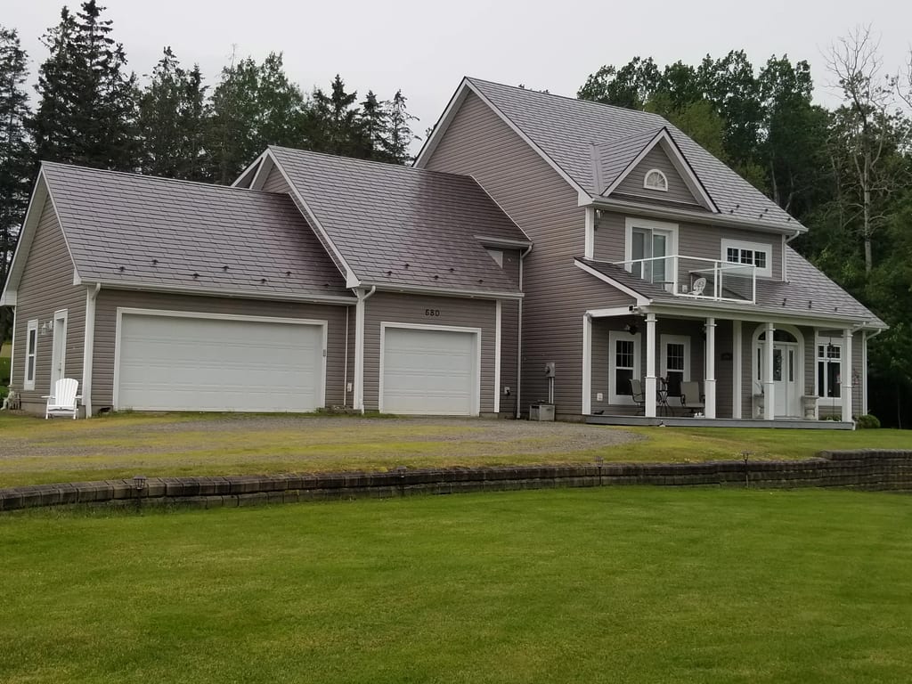 Tudor Brown Interlock Slate aluminum roof on the home, Canning, Nova Scotia