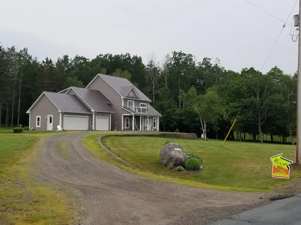 Tudor Brown Interlock Slate aluminum roof on the home, Canning, Nova Scotia