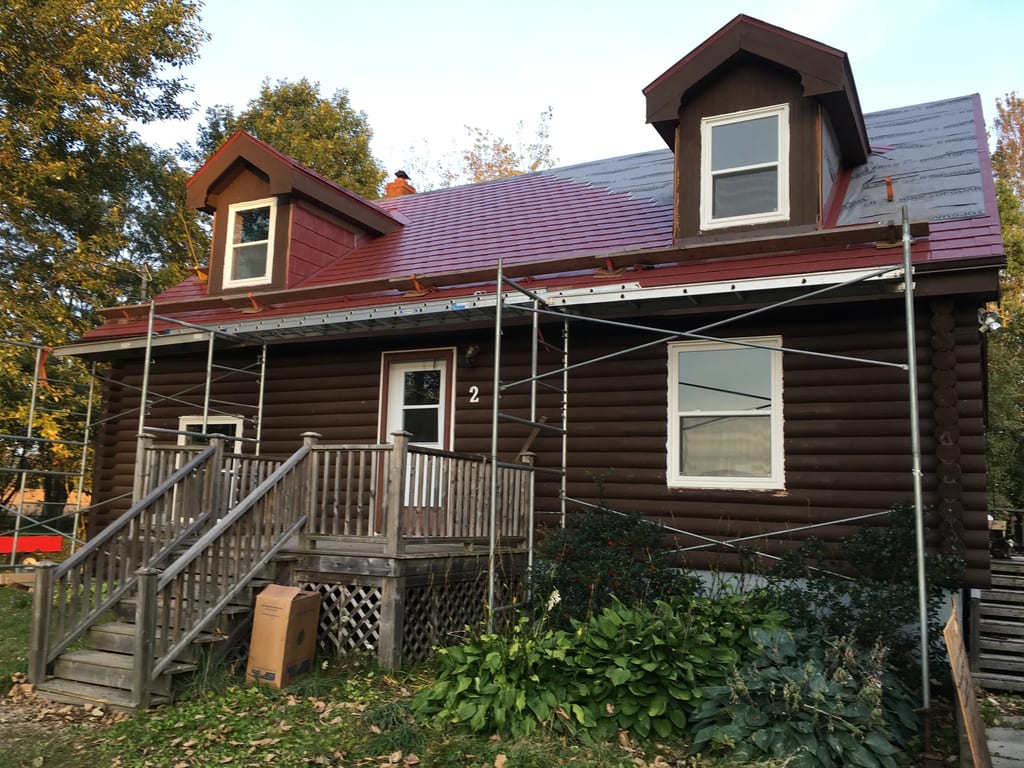 Tile Red Interlock Slate aluminum roof on the home, Woodville, Nova Scotia