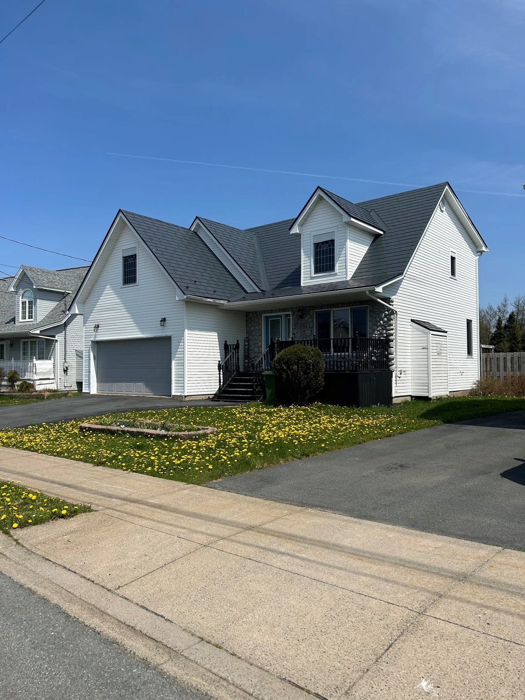 Deep Charcoal Interlock Slate aluminum roof on the home, Eastern Passage, Nova Scotia