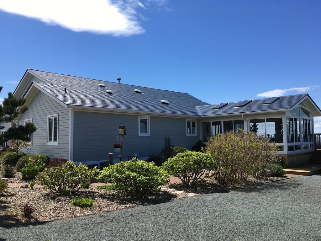 Deep Charcoal Interlock Slate aluminum roof on the home, Morden, Nova Scotia