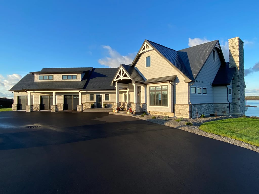 Deep Charcoal Interlock Slate aluminum roof on the home, Sand Beach, Nova Scotia
