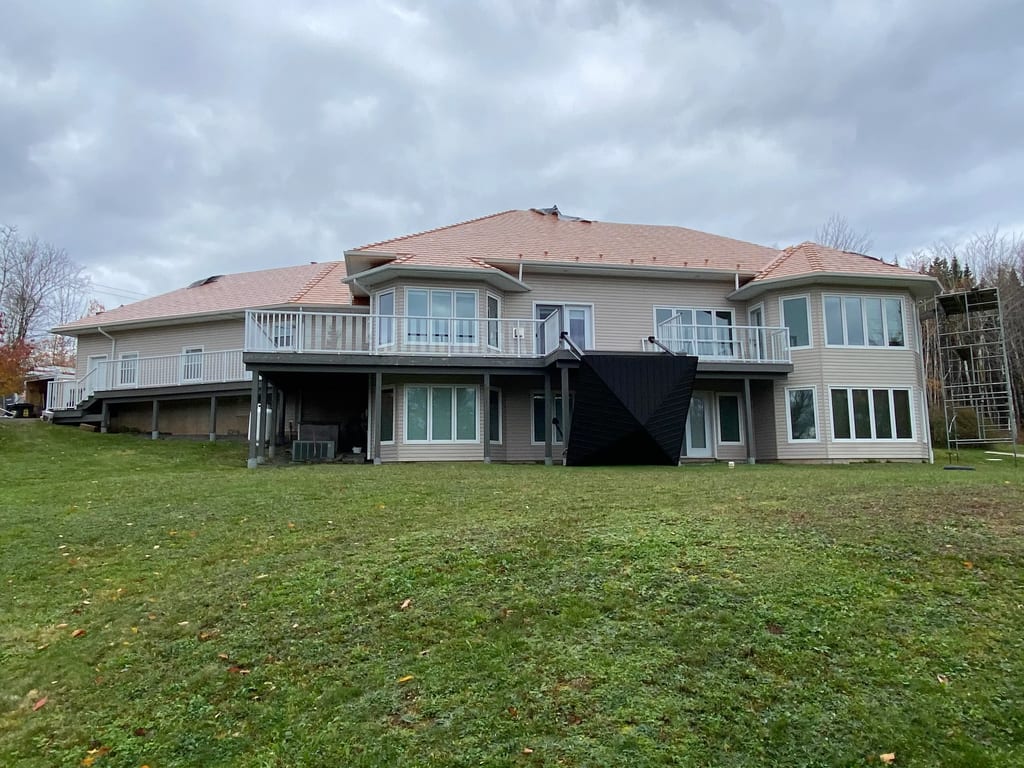 Copper Penny Interlock Slate aluminum roof on the home with ridge cap, Wolfville, Nova Scotia