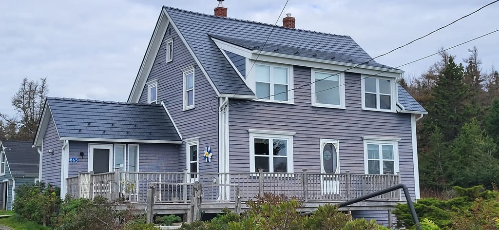 Deep Charcoal Interlock Cedar Shingle aluminum roof on the home, Kingsburg, Nova Scotia