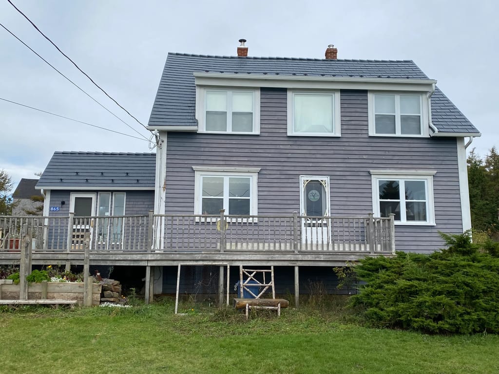 Deep Charcoal Interlock Cedar Shingle aluminum roof on the home, Kingsburg, Nova Scotia