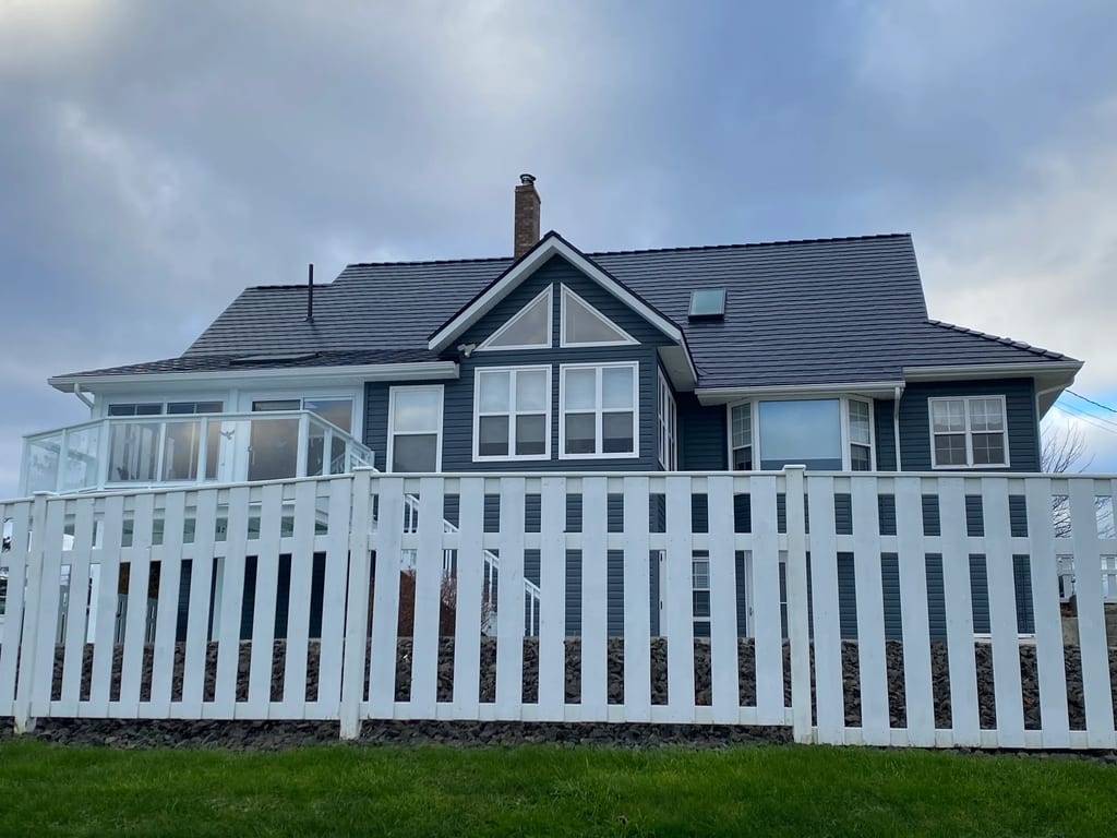 Black Interlock Slate aluminum roof on the home, Cheggogin, Nova Scotia