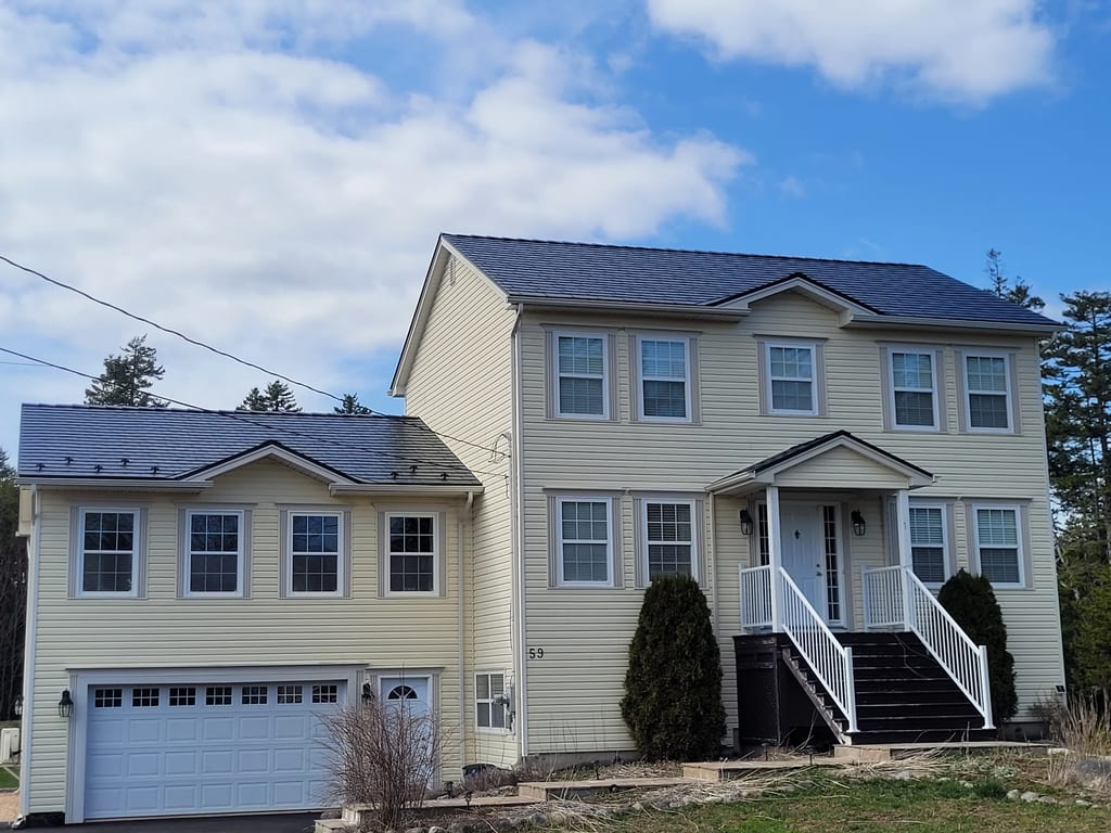 Black Interlock Slate aluminum roof on the home, Hammonds Plains, Nova Scotia