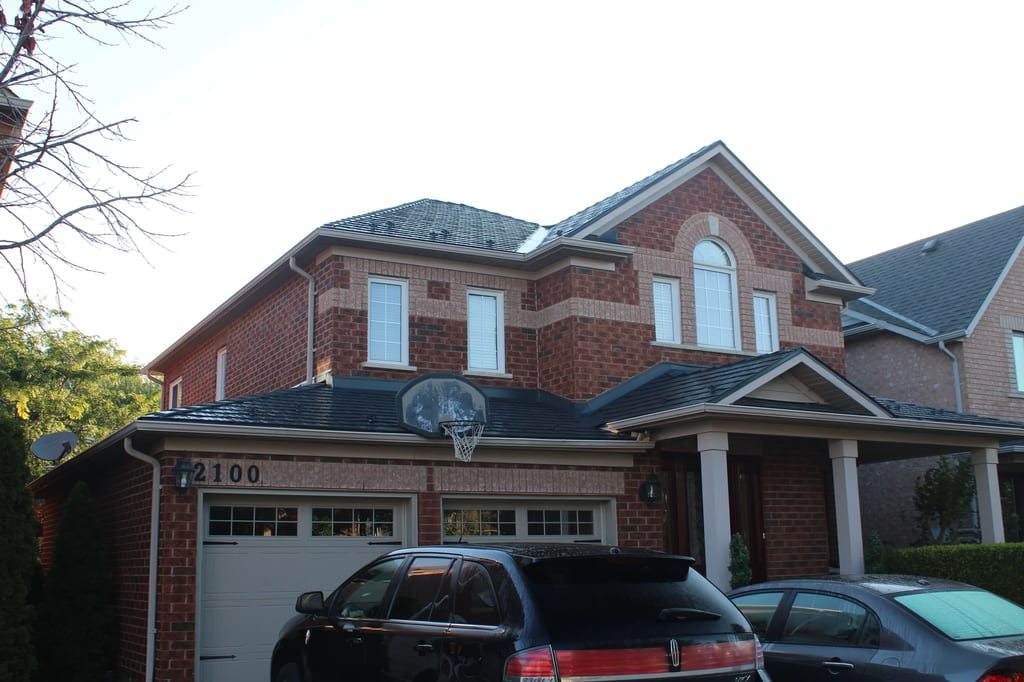 Musket Grey Interlock Slate aluminum roof on a two-storey colonial home with dormers in a suburban, Caledonia, Ontario