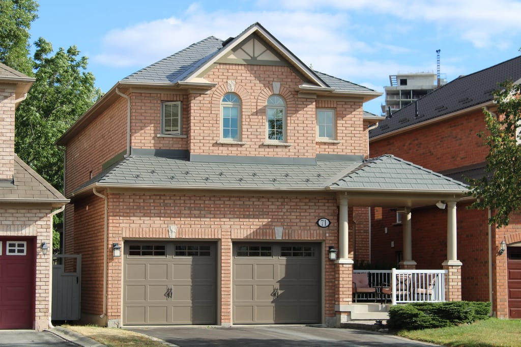 Musket Grey Interlock Cedar Shingle aluminum roof on a two-storey colonial home in a suburban neighbourhood, Scarborough, Ontario