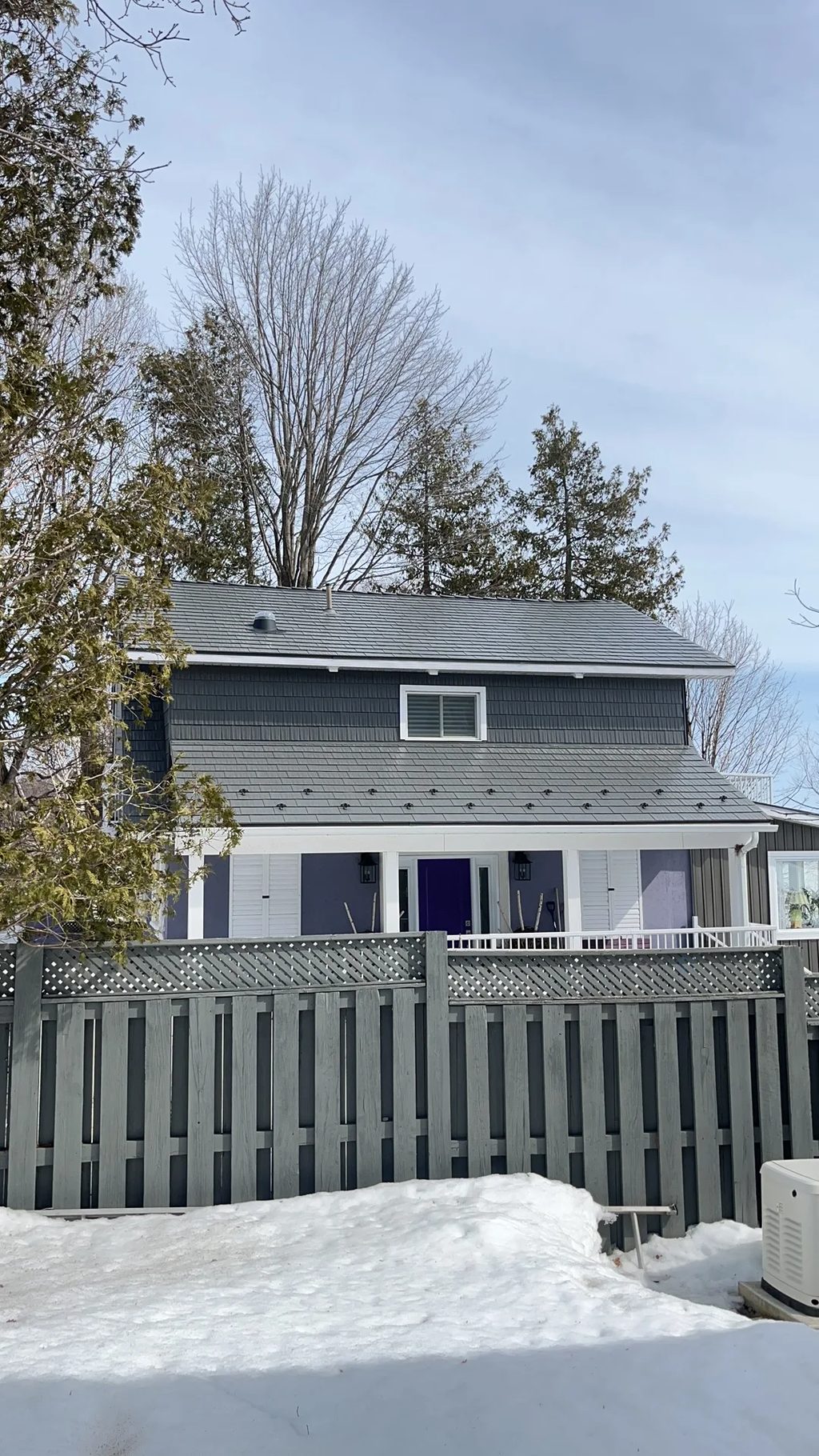 Musket Grey Interlock Cedar Shingle aluminum roof on a two-storey home with a Musket Grey metal roof and a grey, Severn, Ontario