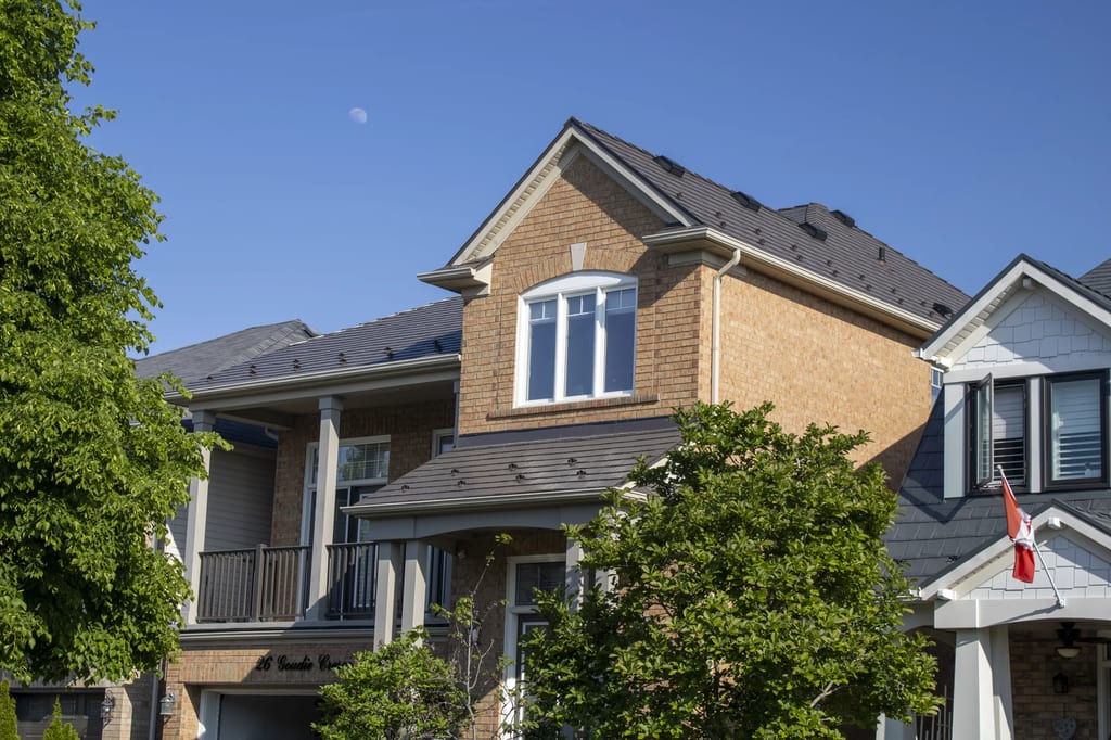 Tudor Brown Interlock Cedar Shingle aluminum roof on a Tudor brown Interlock roof on a two-storey home in a, Stouffville, Ontario