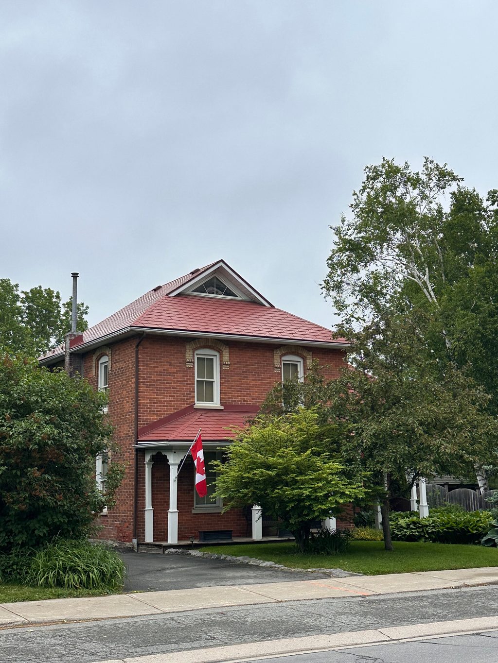 Interlock Aluminum Shingle Metal Roofing – Tile Red | Almonte, ON (Front-left elevation)