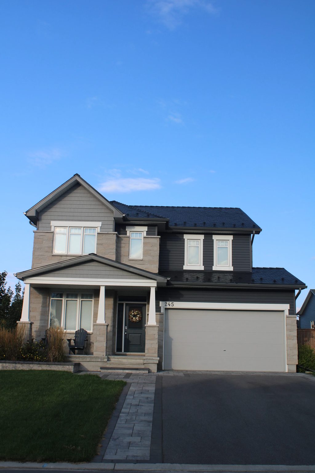 Black Interlock Slate aluminum roof on a two-storey suburban home with a metal roof in Carleton, Carleton Place, Ontario