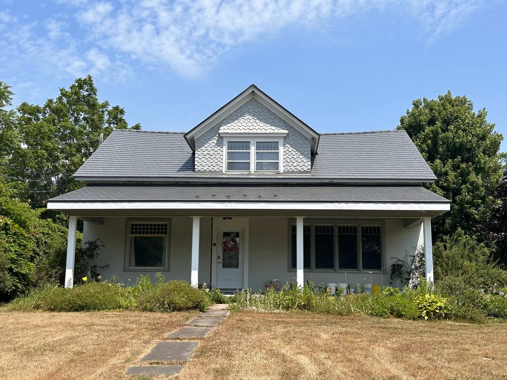 Musket Grey Interlock Slate aluminum roof on a cottage with a Musket Grey Interlock Slate metal roof, Bloomfield, Ontario
