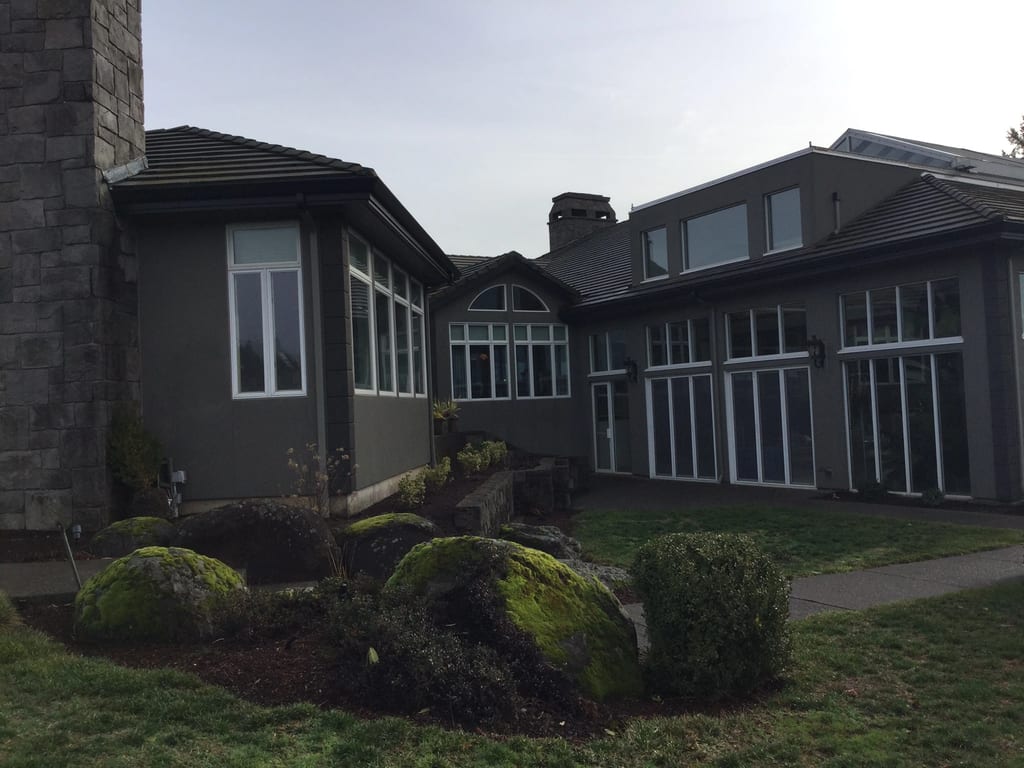 Before: a leaking concrete tile roof on the home, Turner, Oregon, ahead of a Deep Charcoal Interlock IB Membrane aluminum roof