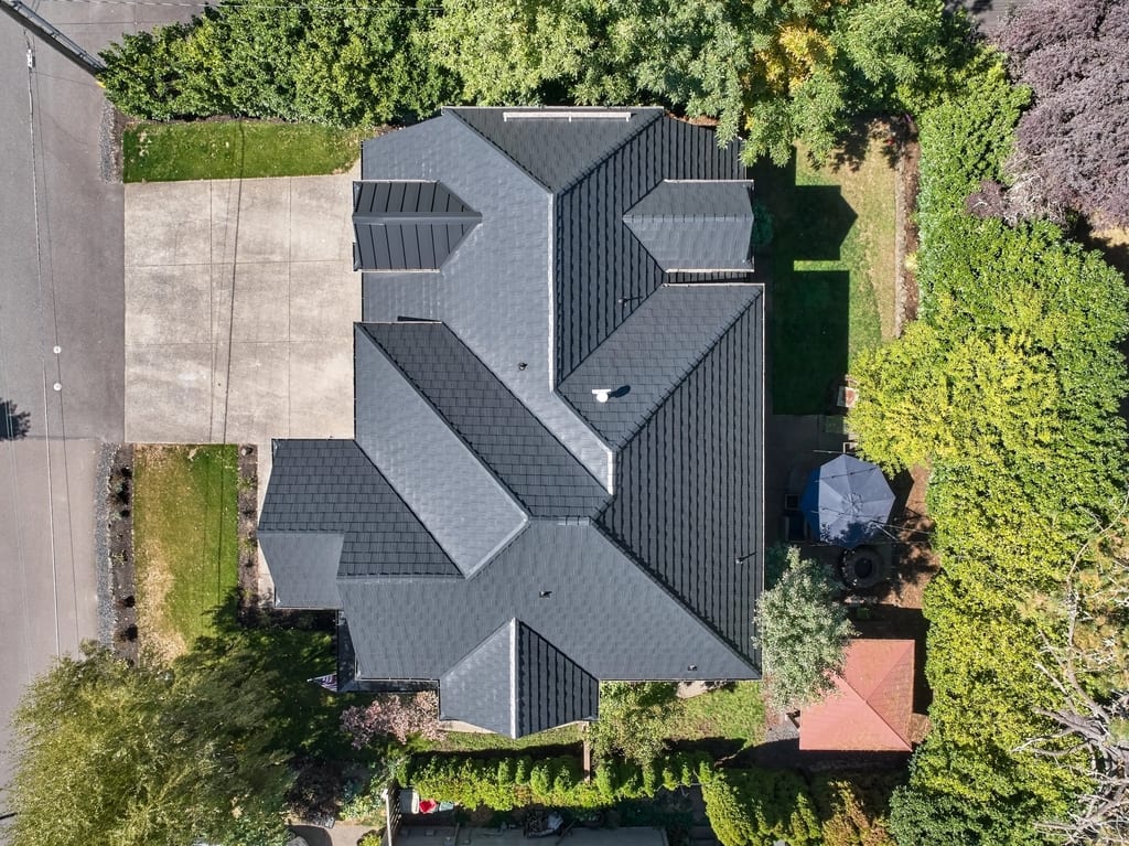 Deep Charcoal Interlock Shake aluminum roof on a large modern home with a deep charcoal metal roof in a, Portland, Oregon