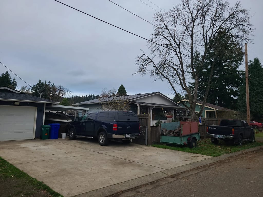 Musket Grey Interlock Slate aluminum roof on a two-storey home with a grey metal roof and a grey garage, Clackamas Clackamas Clackamas Clackamas, Oregon