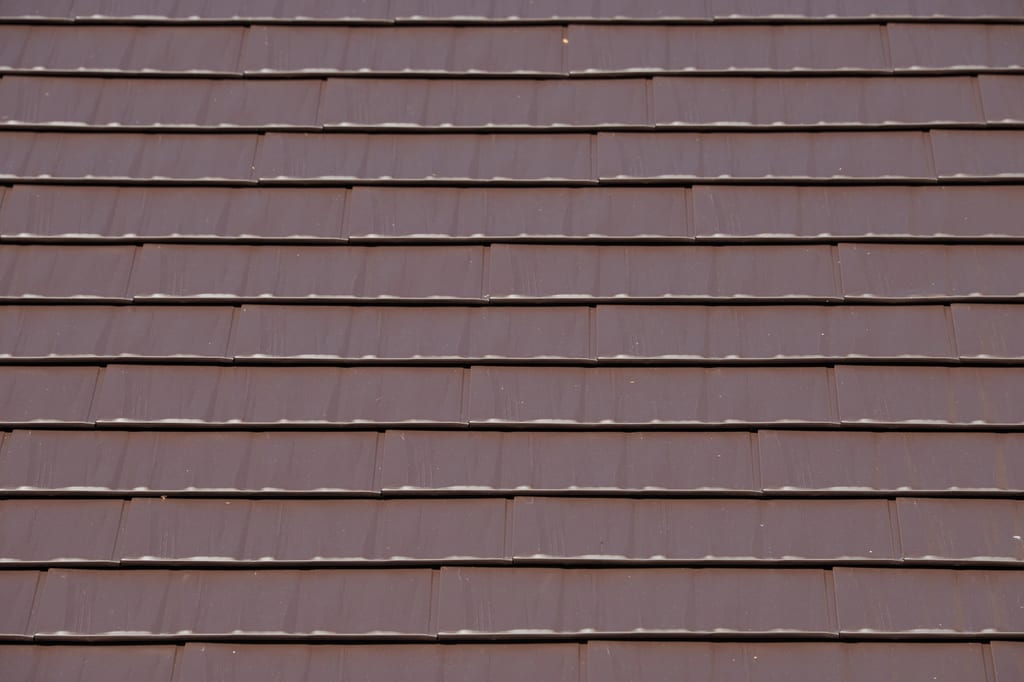 Colonial Brown Interlock Cedar Shingle aluminum roof on a Colonial brown metal roof on a single-family home in, Shoreline, Washington