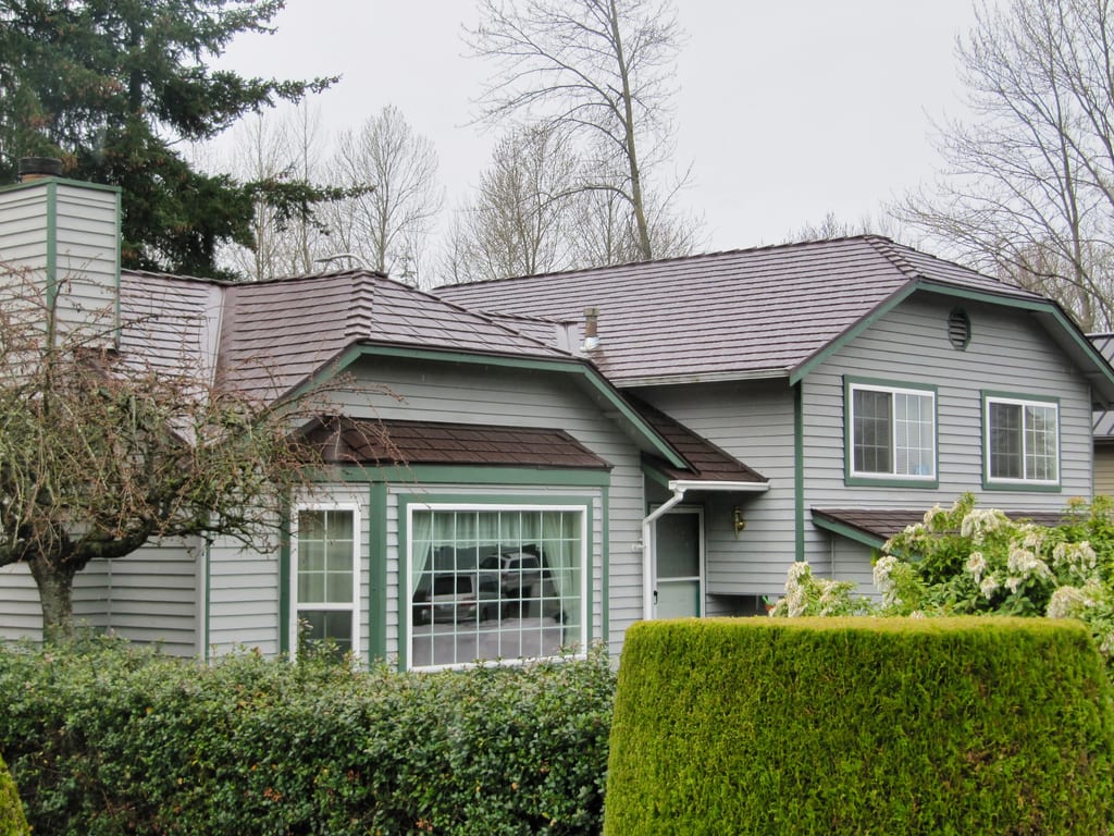 Colonial Brown Interlock Cedar Shingle aluminum roof on a colonial home with a colonial brown metal roof in a, Renton, Washington