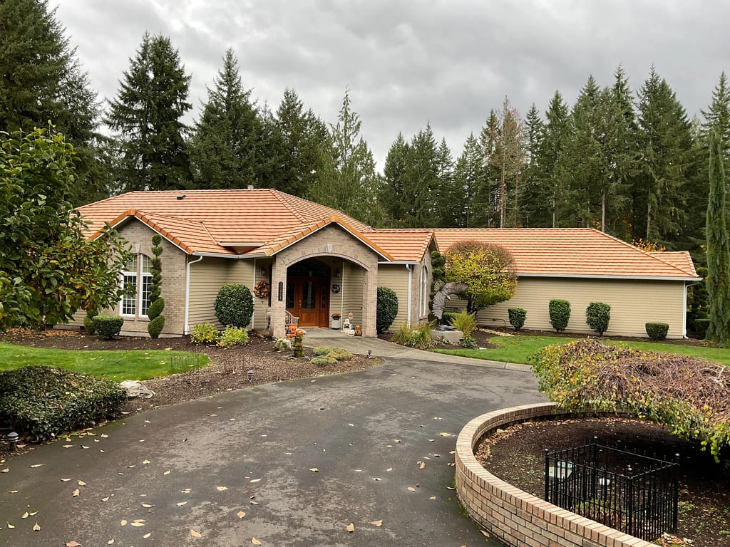 Copper Penny Interlock Shake aluminum roof on a tan ranch style home with a copper penny metal roof among, Auburn, Washington