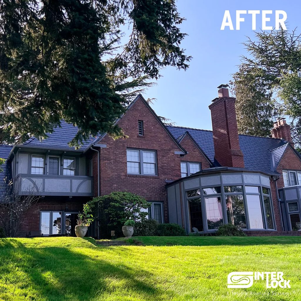 Black Interlock Slate aluminum roof on a brick home with a grey facade and a large backyard in a, Seattle, Washington