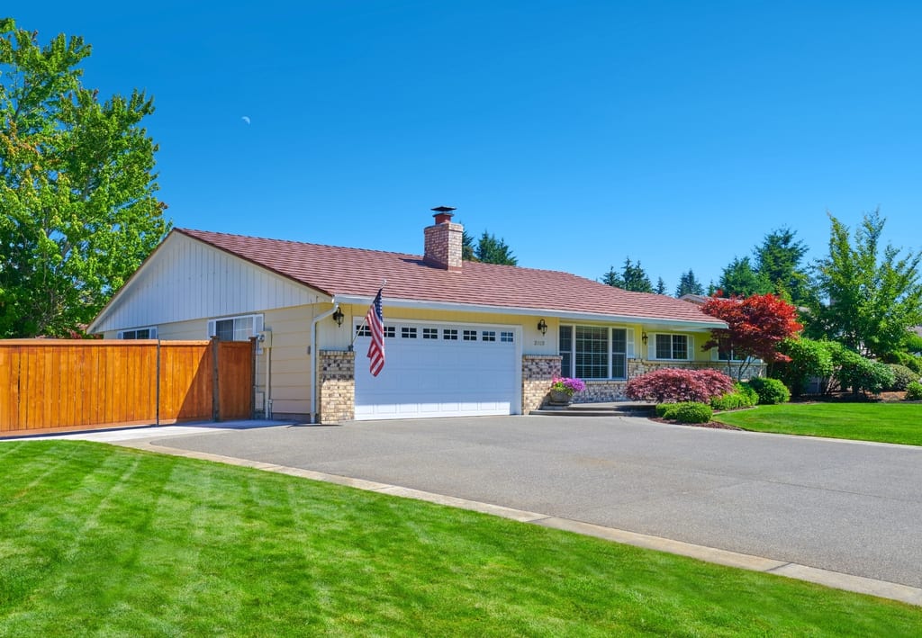 Aged Copper Interlock Shake aluminum roof on a ranch-style home with an aged copper metal roof in a, Puyallup, Washington