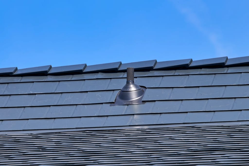 Black Interlock Slate aluminum roof on a black metal roof on a two-storey suburban home, Enumclaw, Washington