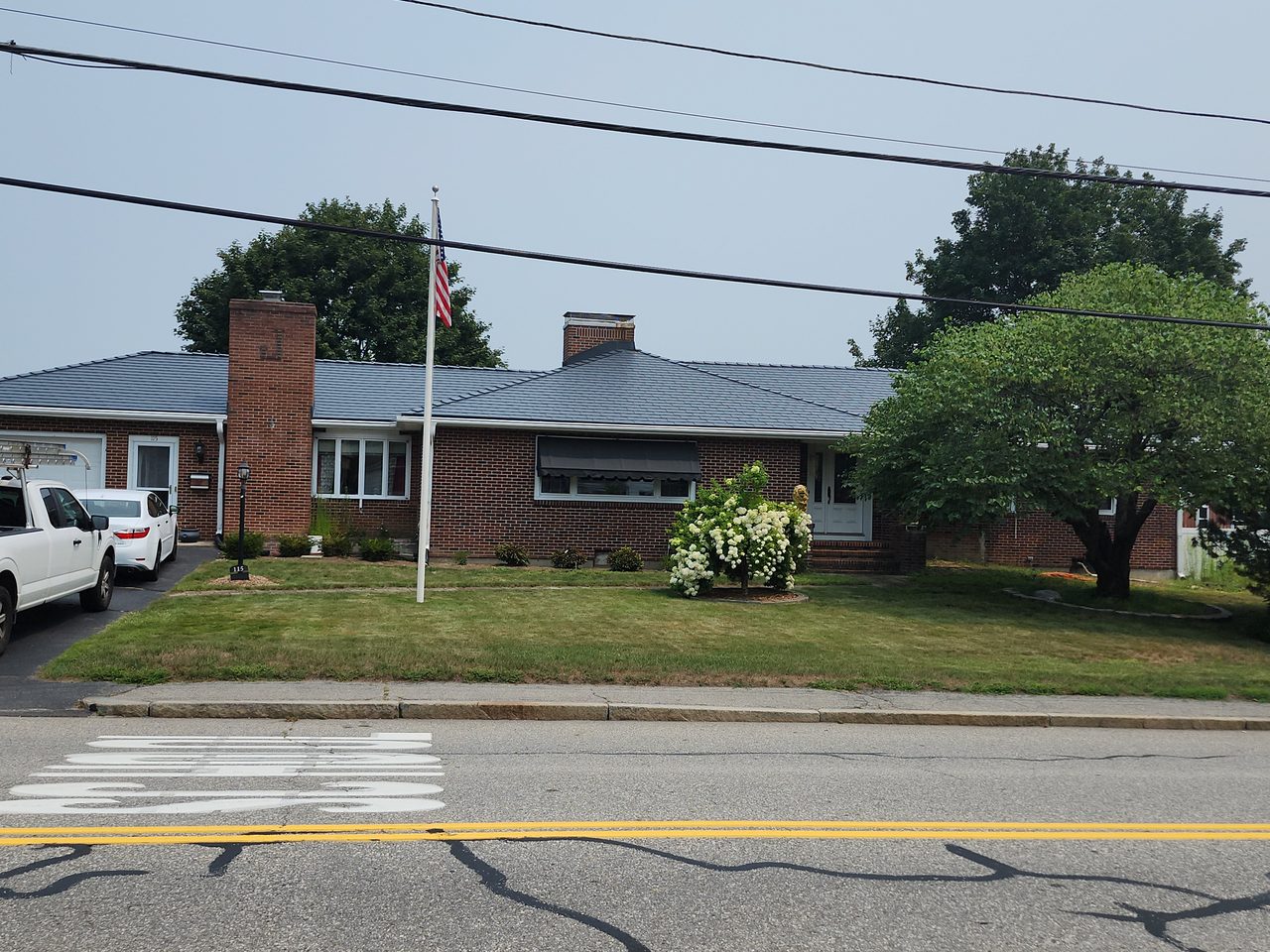 Interlock Aluminum Slate Metal Roofing – Deep Charcoal | Milford, MA (Street view)