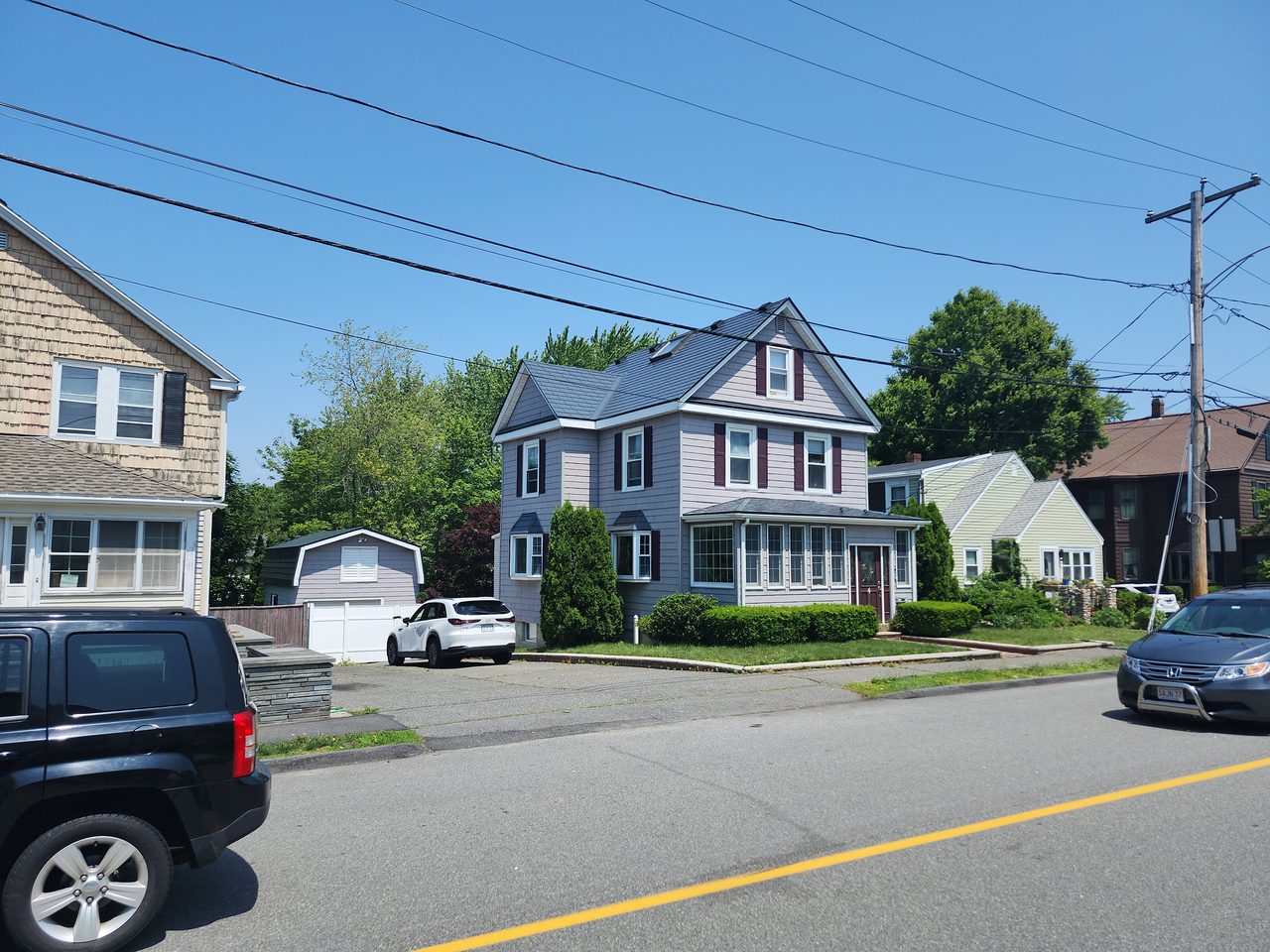 Interlock Aluminum Slate Metal Roofing – Deep Charcoal | Saugus, MA (Front-left elevation)