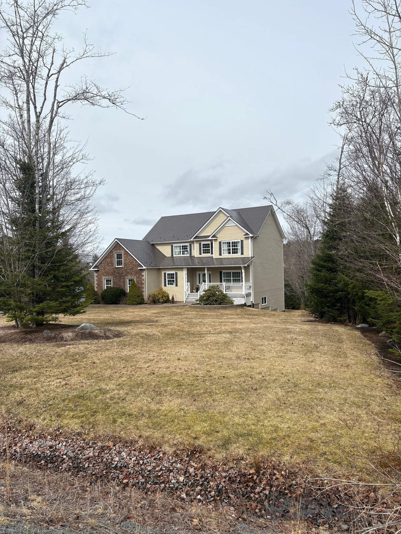 Tudor Brown Interlock Slate aluminum roof on the home, Fall River, Nova Scotia