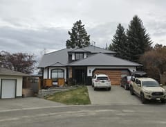 Black Interlock Slate aluminum roof on a black and white modern home with a metal roof on a rural, Kamloops, British Columbia
