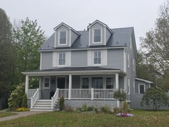 Black Interlock Slate aluminum roof on the home, Mahone Bay, Nova Scotia