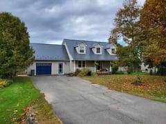 Deep Charcoal Interlock Slate aluminum roof on the home with roof louver and ridge cap, Kentville, Nova Scotia