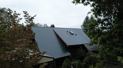 Hunter Green Interlock Cedar Shingle aluminum roof on the home, University Place, Washington